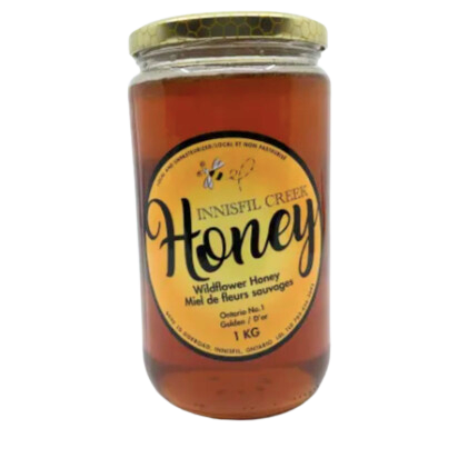 a one kilo jar of 100% wildflower honey from Innisfil Creek Honey