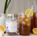 Load image into Gallery viewer, Amalfi afternoon cocktail infusion kit and a glass with an iced tea cocktail with a slice of lemon
