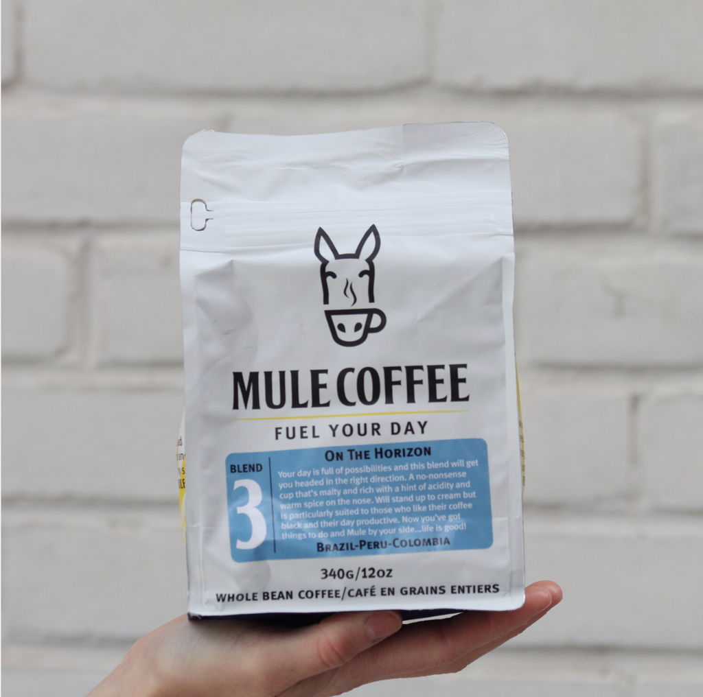 340 g On The Horizon Mule Coffee white pouch with light blue label