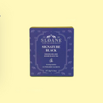 Load image into Gallery viewer, Sloane Signature Black tea package on a light yellow surface.
