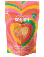 Load image into Gallery viewer, Colorful package of Squish vegan sour peach hearts candy with heart design
