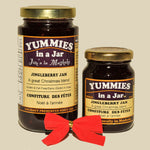 Load image into Gallery viewer, Two jars of Yummies in a Jar Jingleberry Jam with a red bow on a beige background. Jar sizes are 125ml and 250ml
