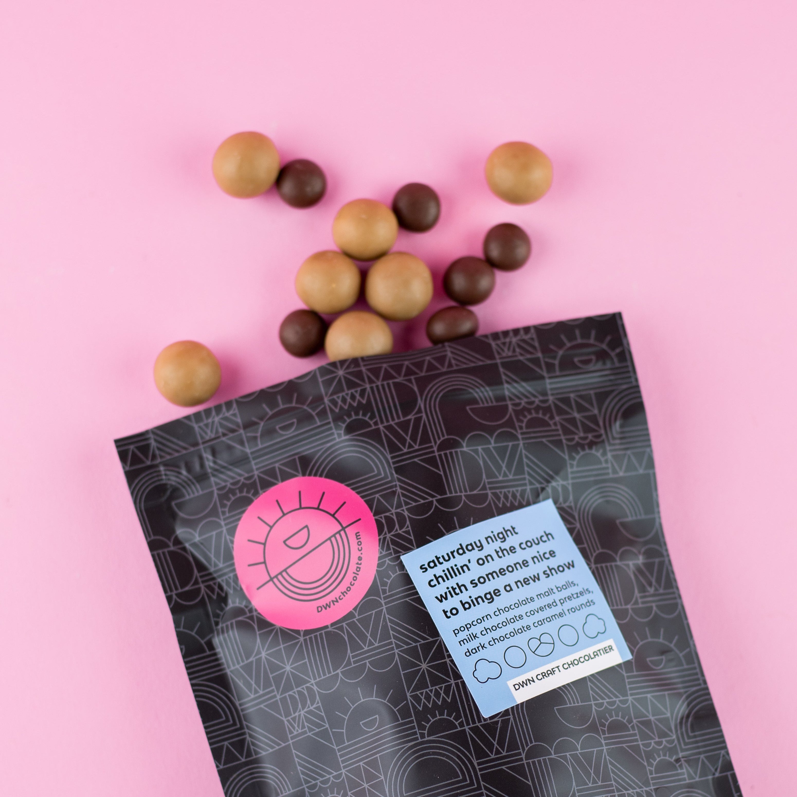 DWN pouch with chillin' mix falling out a pink background