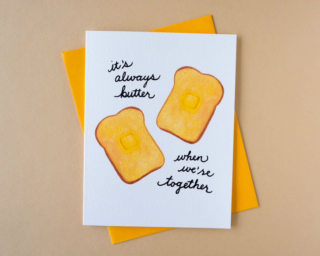 Card with bread slices and butter, text 'it's always butter when we're together', on a beige background