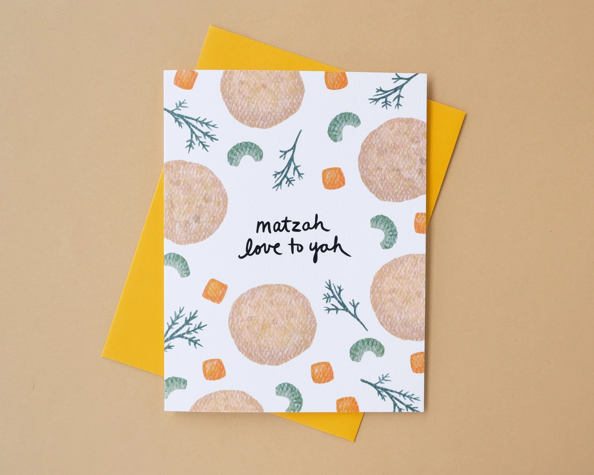 Card with matzah design and text 'matzah love to yah' on a beige background