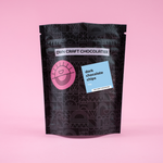 Load image into Gallery viewer, black DWN pouch with a dark chocolate chip sticker
