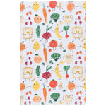 Load image into Gallery viewer, white tea towel featuring a colourful, whimsical print of smiling cartoon fruits, vegetables, and breakfast foods, including tomatoes, carrots, broccoli, bananas, cucumbers, strawberries, and fried eggs on toast
