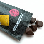 Load image into Gallery viewer, chocolate honeycomb pieces falling out of its packaging
