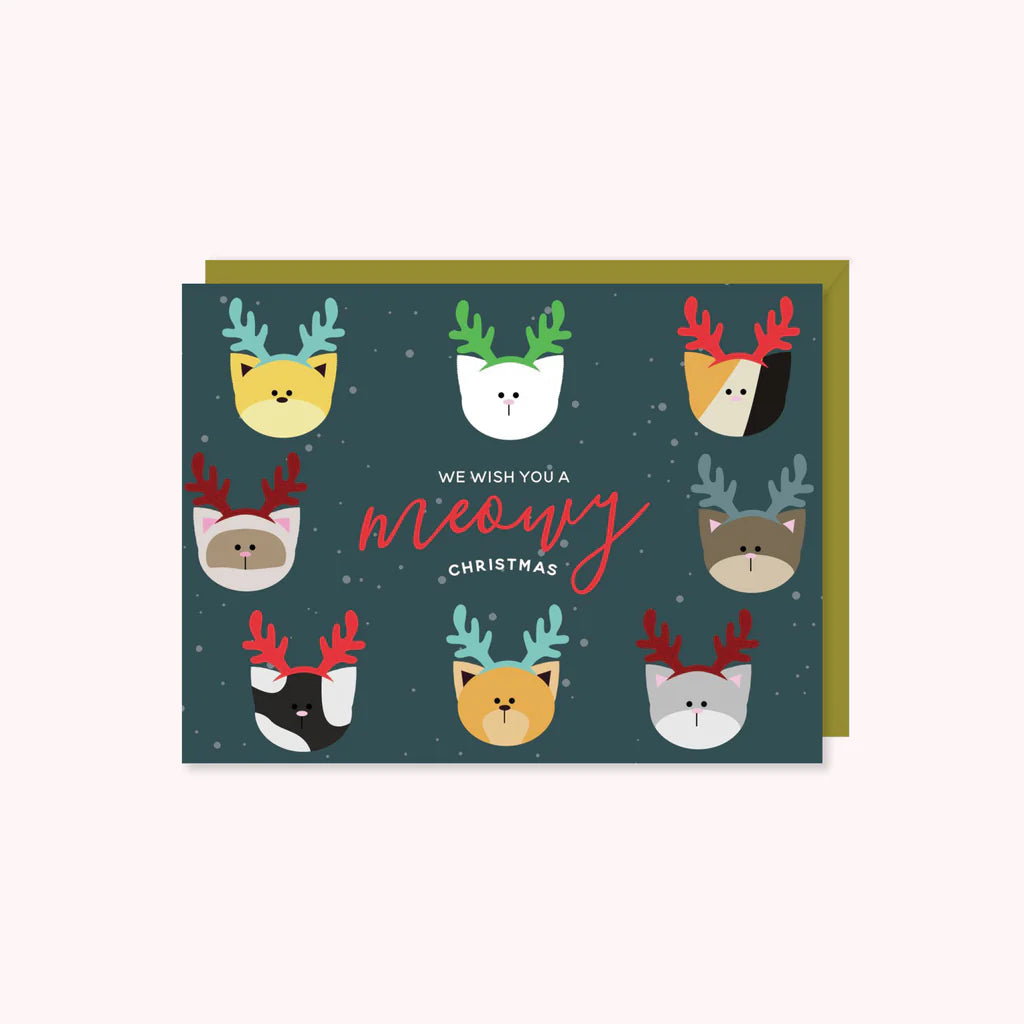 cats wearing antlers border the card with the words "we wish you a meowy christmas" in the middle