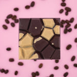 Load image into Gallery viewer, mocha latte mylk chocolate bar on a pink background
