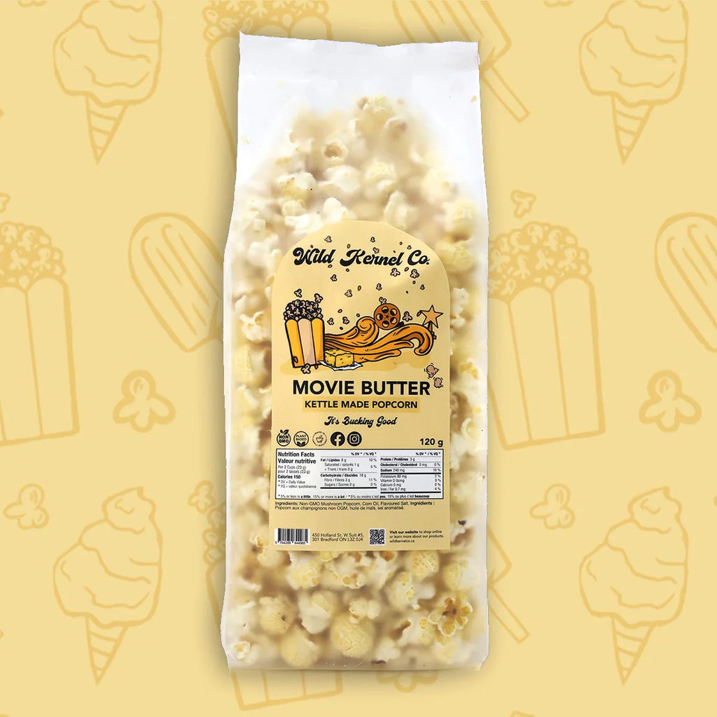 Bag of Wild Kernel Co. Movie Butter popcorn on a yellow background.