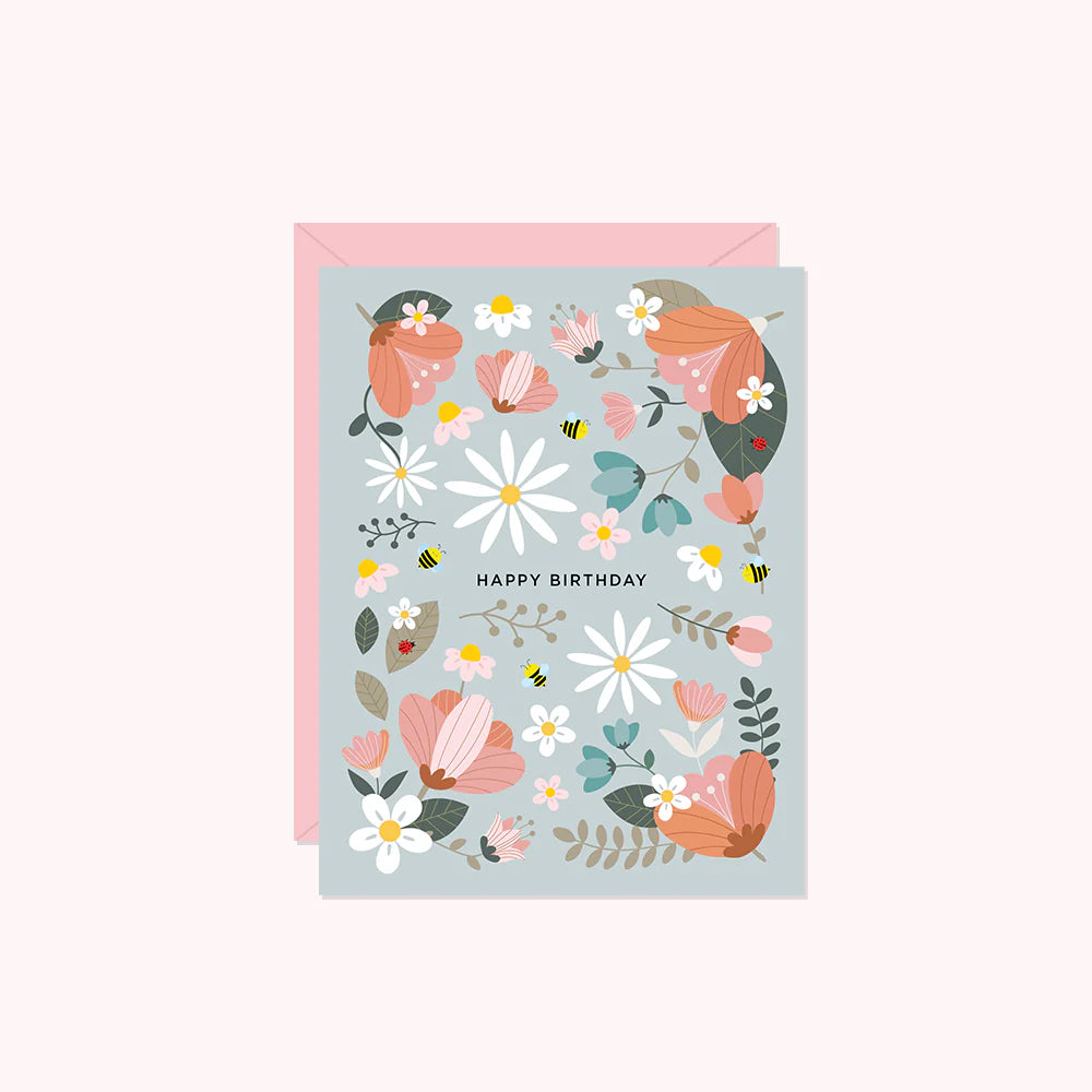 happy birthday is written on a sage green background and surrounded by flowers
