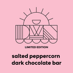 Load image into Gallery viewer, logo and text for limited edition salted peppercorn dark chocolate bar on a pink background

