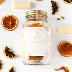 Load image into Gallery viewer, winter white sangria cocktail infusion kit jar surrounded by dried oranges
