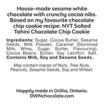 Load image into Gallery viewer, Sesame chocolate chip cookie bar ingredient label that reads, &quot;house-made sesame white chocolate with crunchy cocoa nibs. Based on my favourite NYT salted tahini chocolate chip cookie recipe. Ingredients: Sugar, Cocoa Butter, Sesame Seeds, Milk Powder, Caramel (Skimmed Milk, Whey, Sugar, Butter, Flavouring), Cocoa Beans, Butter, Soy Lecithin, Salt. Contains Milk, Soy and Sesame Seeds.  May contain traces of Nuts, Tree Nuts, Peanuts, Sesame Seeds and Wheat. Happily made in Orillia, Ontario. DWNchocolate.com&quot;
