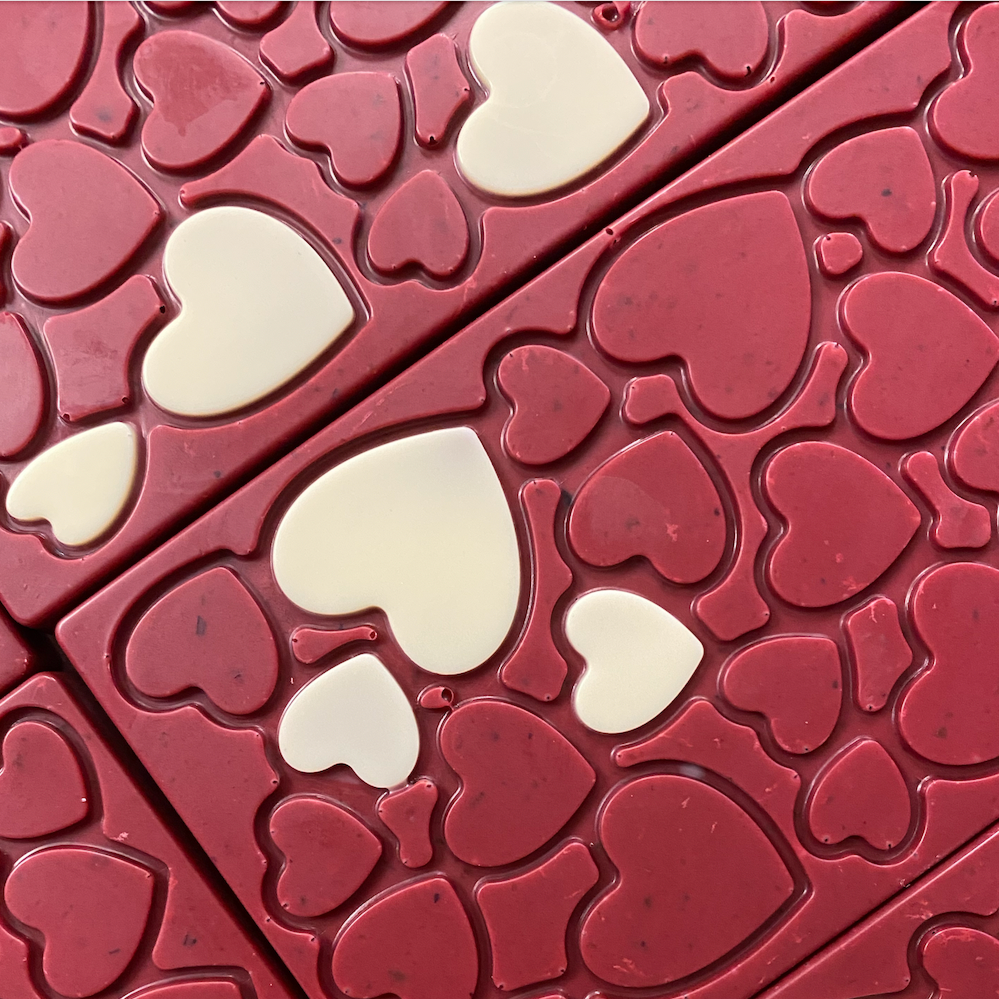 close up of the heart pattern on the raspberry toffee bar