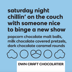Load image into Gallery viewer, blue background with black text that reads, &quot;saturday night chillin&#39; on the couch with someone nice to binge a new show. popcorn chocolate malt balls, milk chocolate covered pretzels, dark chocolate caramel rounds.&quot;
