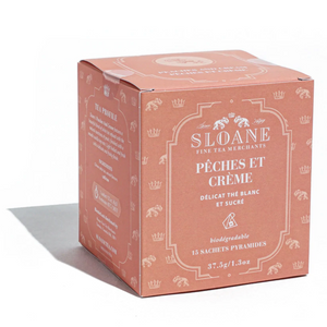 a box of Peaches and Cream Sloane Tea on a white background