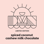 Load image into Gallery viewer, black text on a peach-coloured background that reads, &quot;limited edition. spiced coconut cashew milk chocolate&quot;
